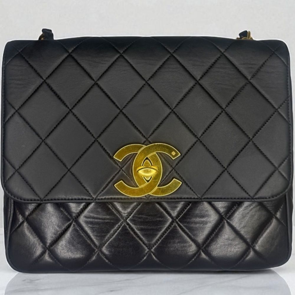 CHANEL Black Quilted Flap 24K Gold CC Logo Leather Shoulder Bag